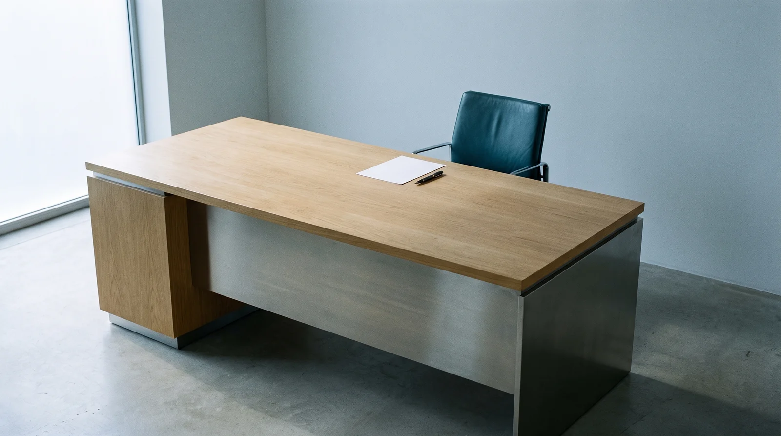 A single unsigned document alone on an empty desk, illustrating a nominal medical director arrangement.